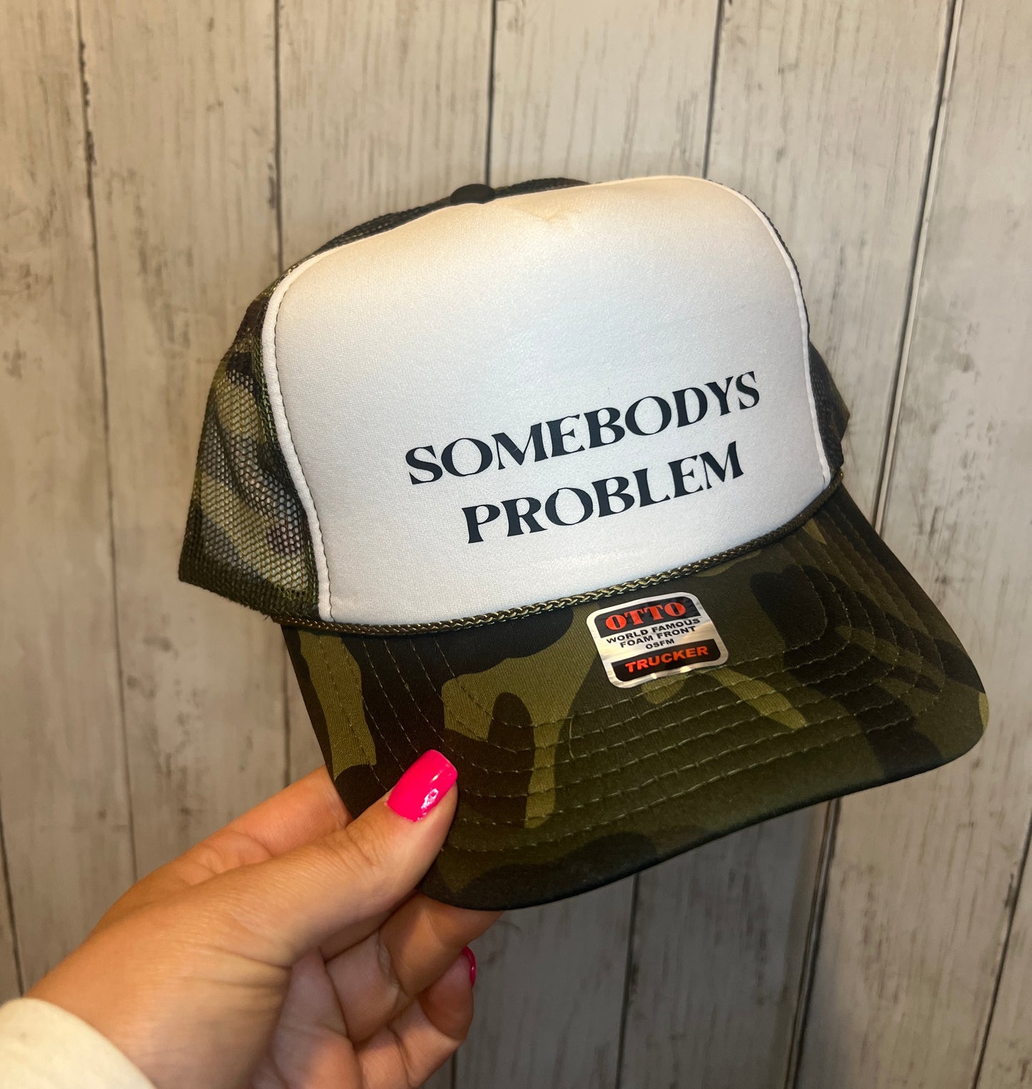 Somebodys Problem Trucker Hat